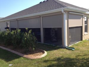 Picture of a house with beautiful new retractable screens.